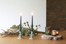 Load image into Gallery viewer, Green Tiered Candlestick Holder by Izzy Letty. Shop the range of hand sourced ceramics and glassware by Rebecca Arts online.