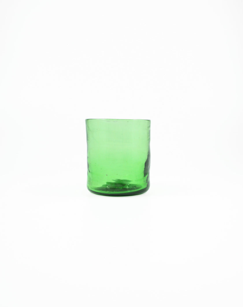 Handblown Green Tumbler Glass. Shop the range of hand sourced ceramics and glassware by Rebecca Arts online.
