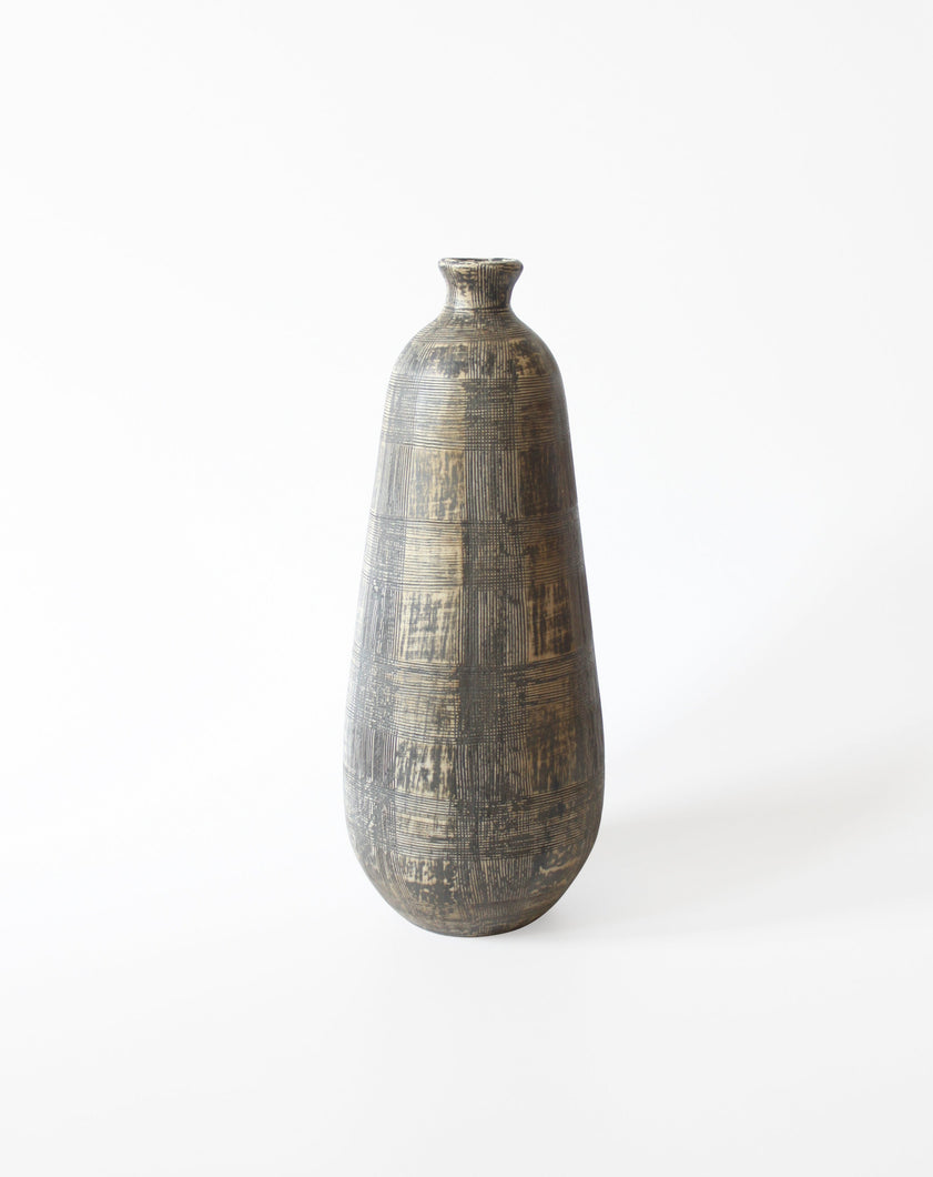 Textured ceramic vessel in brown. Shop the range of hand sourced ceramics and glassware by Rebecca Arts online.