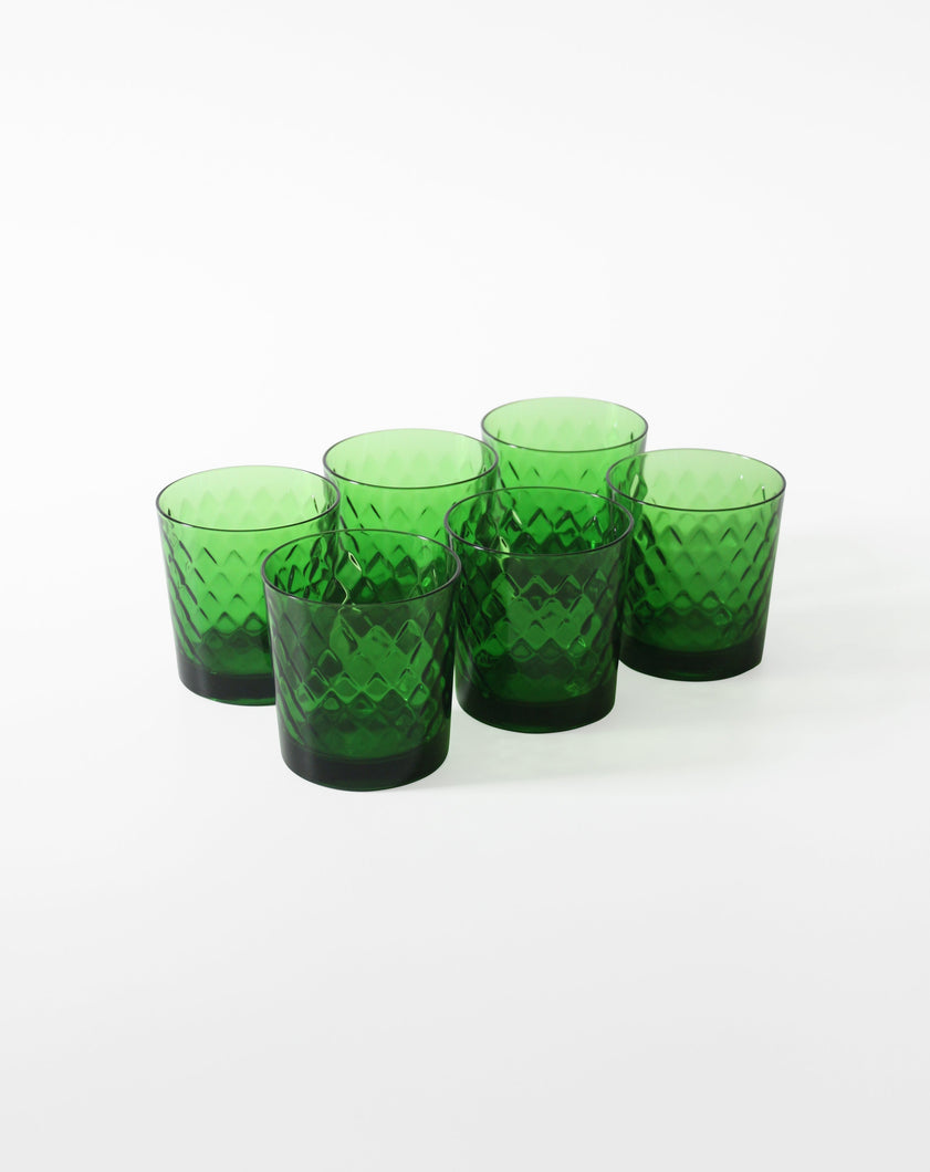 Set of six reverse diamond tumbler glasses in green. Shop the range of hand sourced ceramics and glassware by Rebecca Arts online.