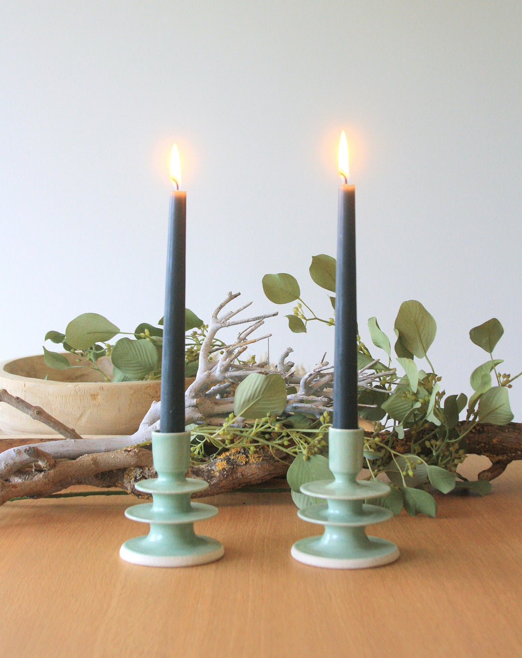 Green Tiered Candlestick Holder by Izzy Letty. Shop the range of hand sourced ceramics and glassware by Rebecca Arts online.