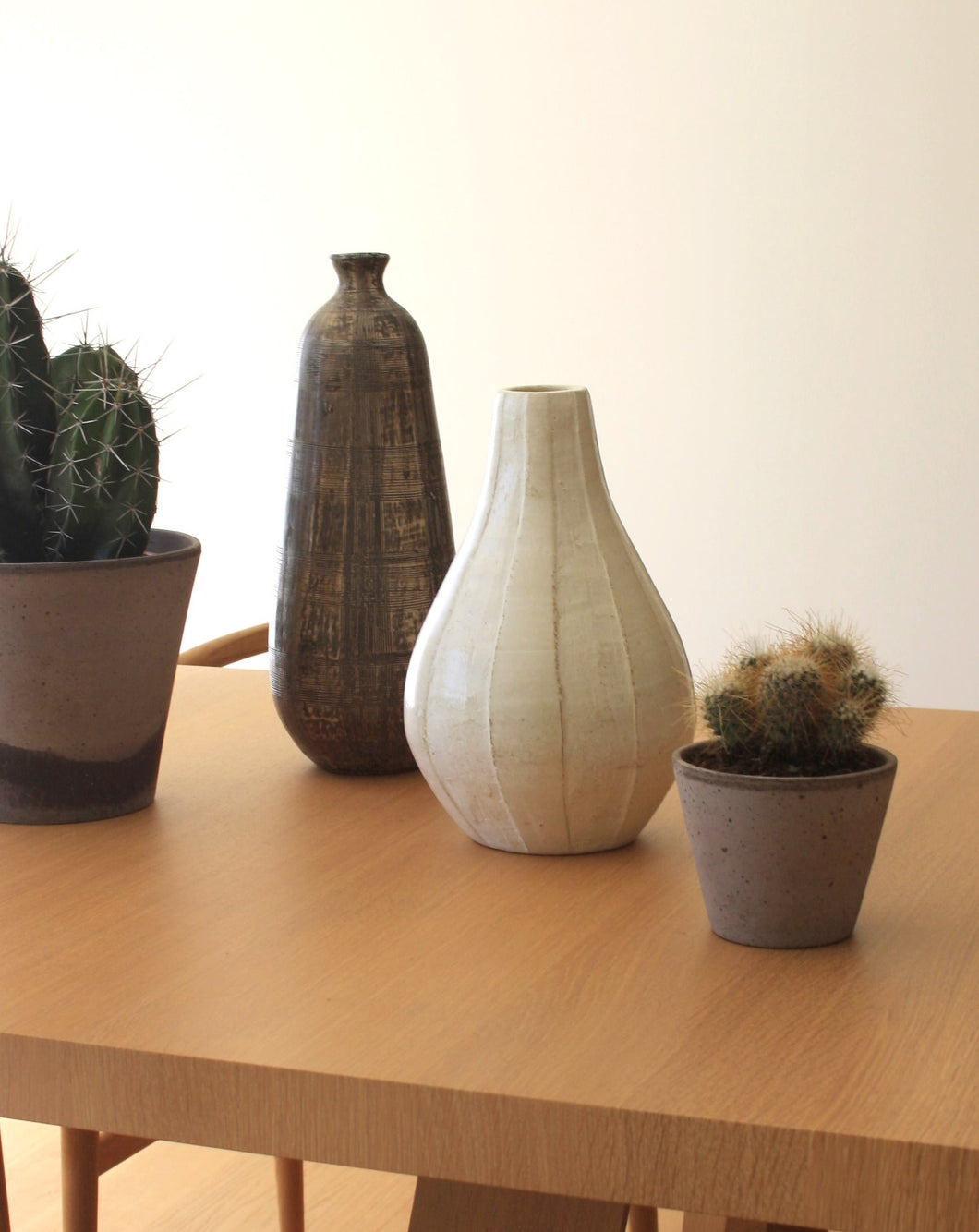 Studio ceramic vessel in white. Shop the range of hand sourced ceramics and glassware by Rebecca Arts online.