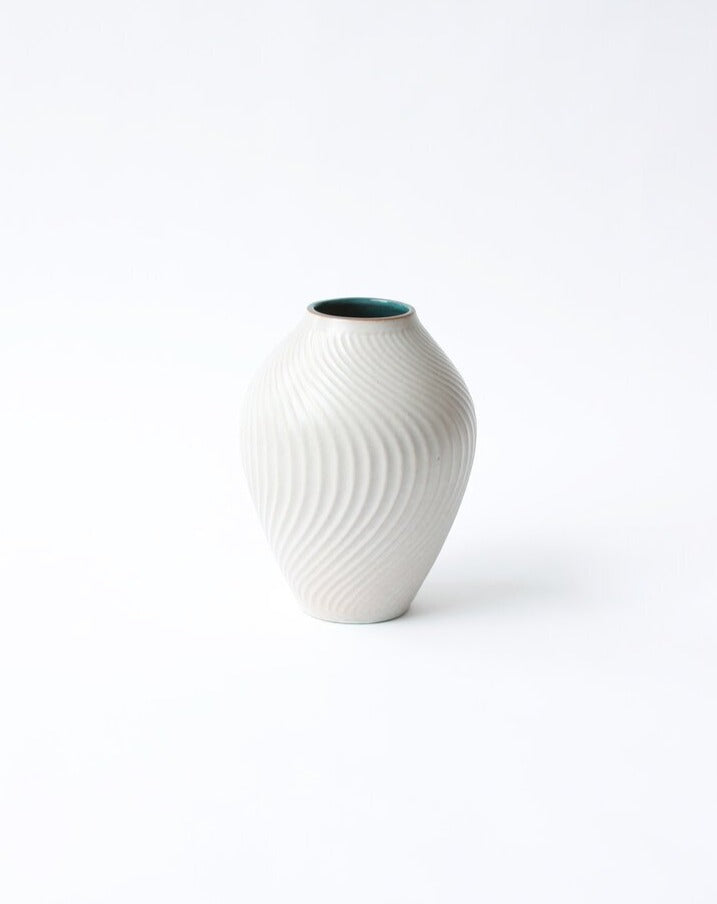 West German ceramic swirled vase. Shop the range of hand sourced glassware and ceramics by Rebecca Arts online.