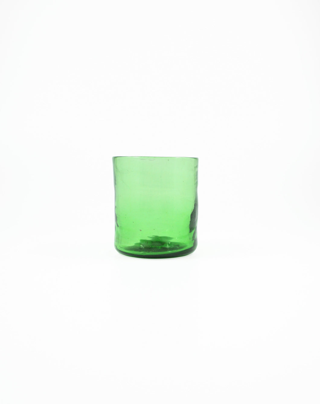 Handblown Green Tumbler Glass. Shop the range of hand sourced ceramics and glassware by Rebecca Arts online.