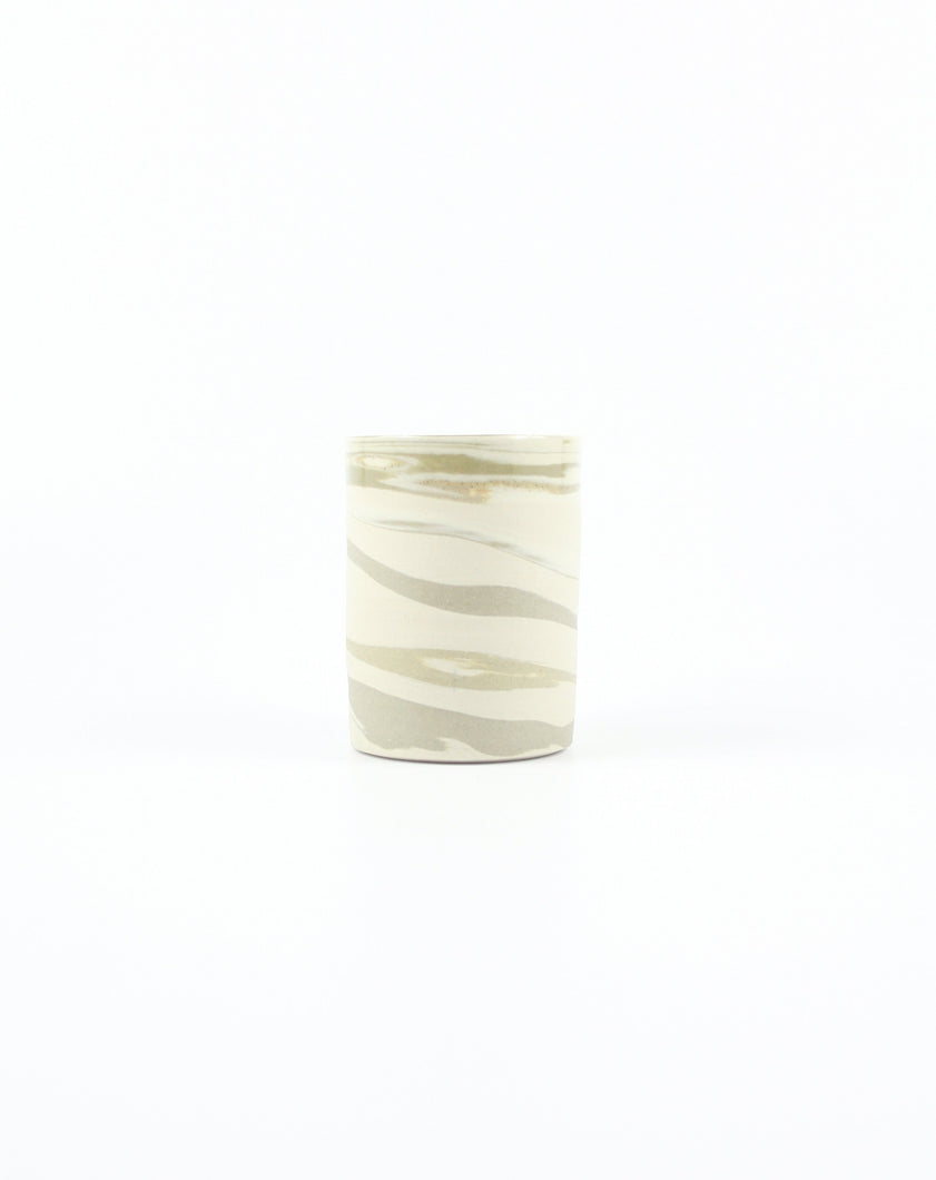 Off White Ceramic Neriage Tumbler by Sam Andrew. Shop the range of hand sourced ceramics and glassware by Rebecca Arts online.
