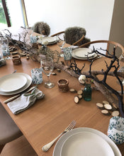 Load image into Gallery viewer, Styled on a driftwood summer table top, the white and turquoise speckled Murano tumblers are available to purchase online. Shop the range of hand sourced glassware by Rebecca Arts.
