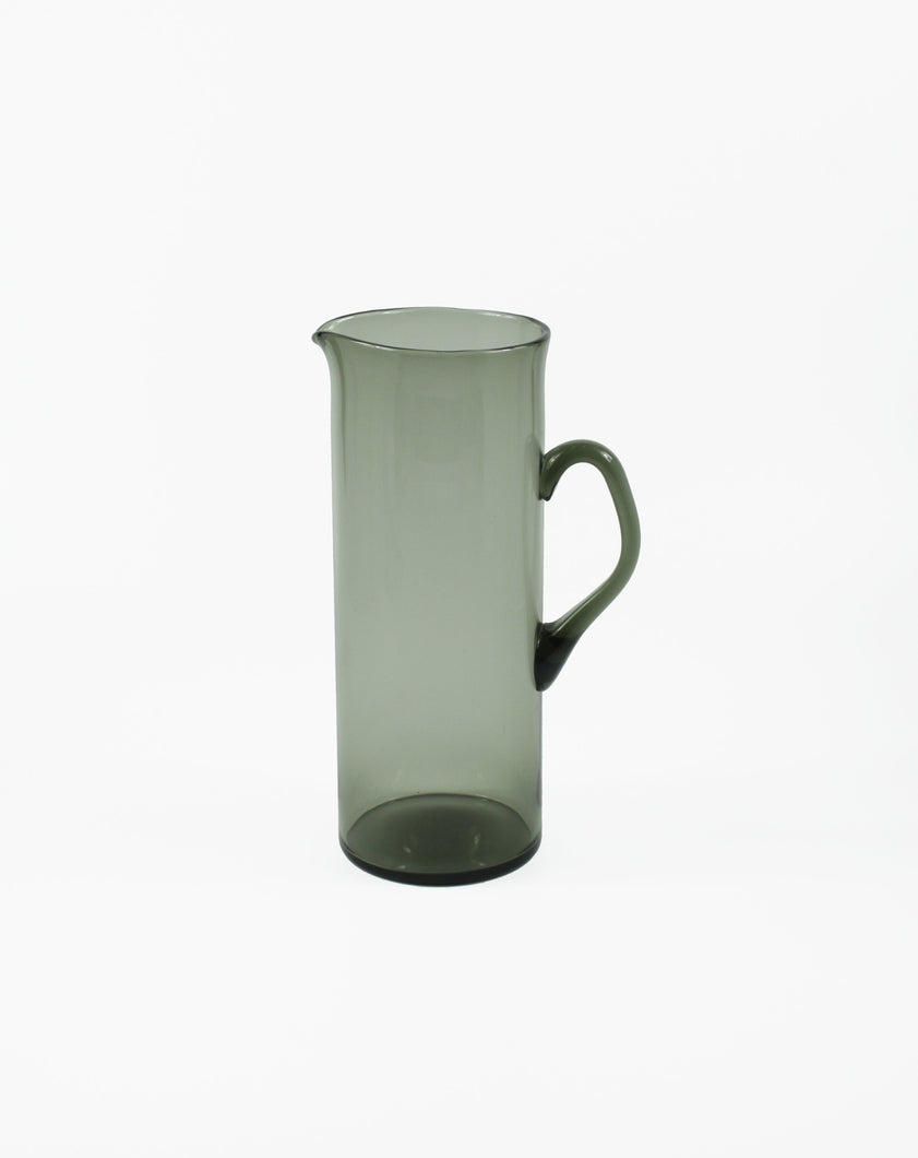 Smoked Glass Pitcher. Shop the range of hand sourced ceramics and glassware by Rebecca Arts online.