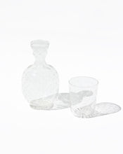 Load image into Gallery viewer, Carafe and tumbler glass dating from the Edwardian era and featuring a star cut pattern. Shop the range of hand sourced glassware and ceramics by Rebecca Arts online.
