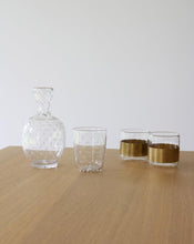 Load image into Gallery viewer, Carafe and tumbler glass dating from the Edwardian era and featuring a star cut pattern. Shop the range of hand sourced glassware and ceramics by Rebecca Arts online.

