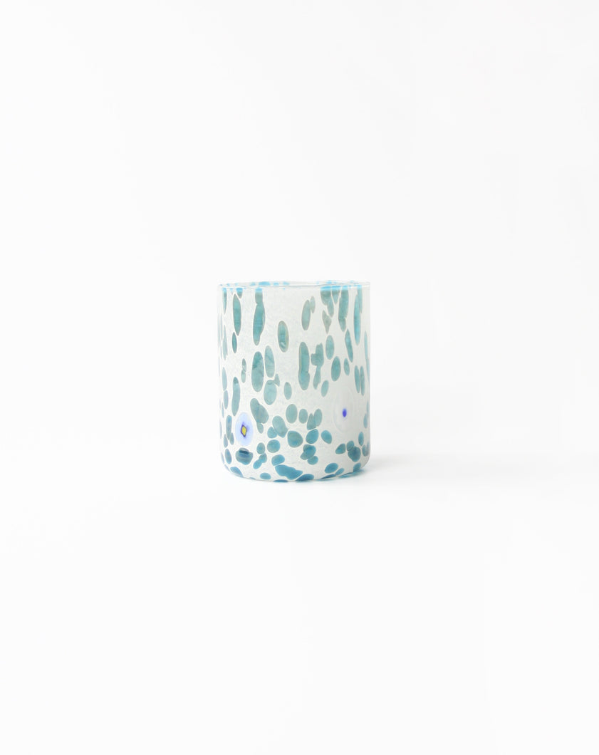 Murano tumbler in white and turquoise speckled design. Shop the range of Murano tumblers hand sourced by Rebecca Arts online.